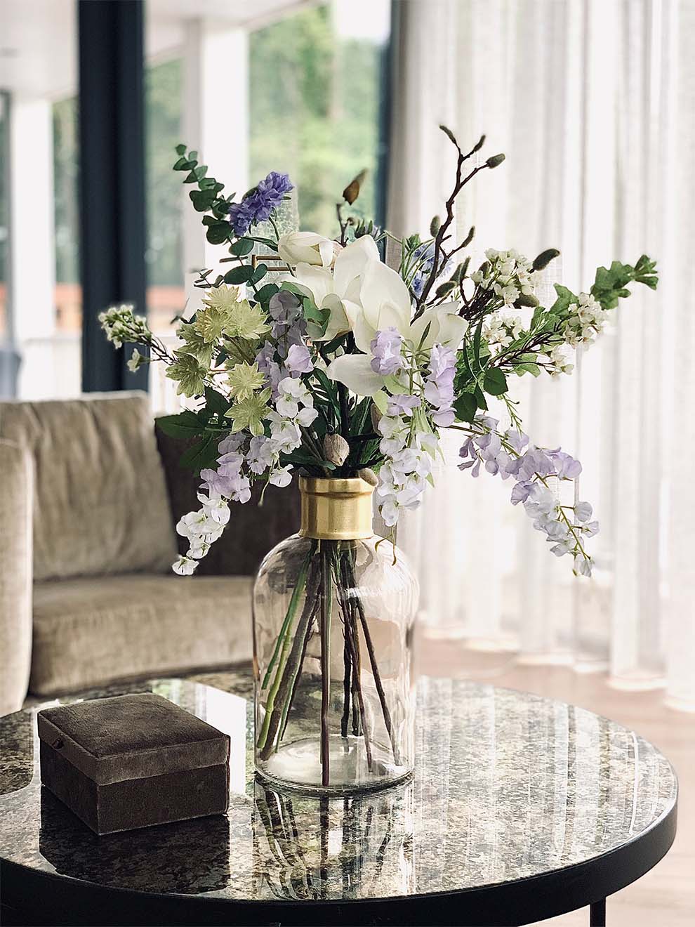 Purple flowers in a glass vase
