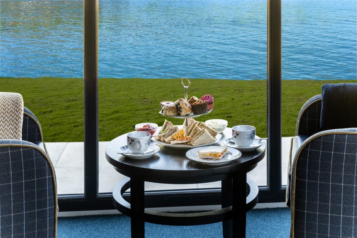 Afternoon Tea on Table by Large Window