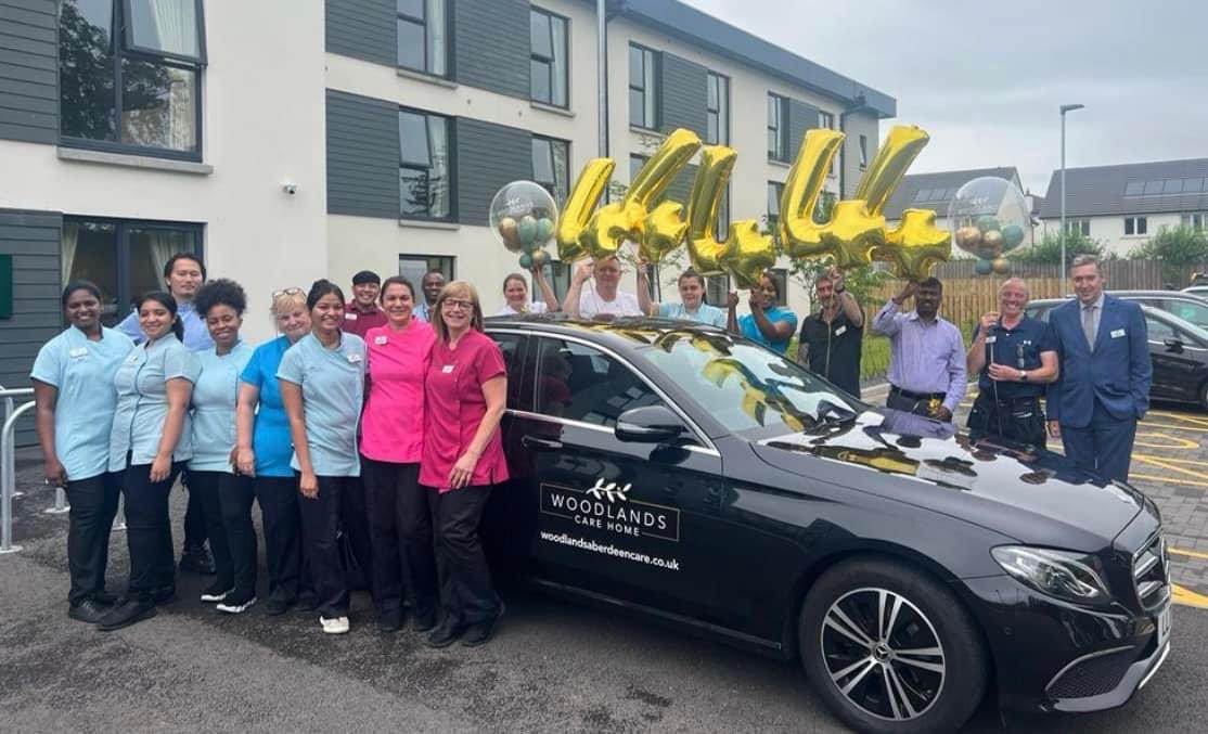 Staff Holding Balloons, Standing by Woodlands Mercedes Car